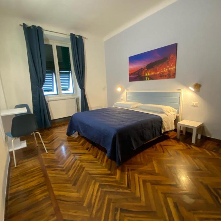 AffittaCamere Columbus - Camera Matrimoniale/Doppia con Letti Singoli con Bagno Privato Esterno - 2