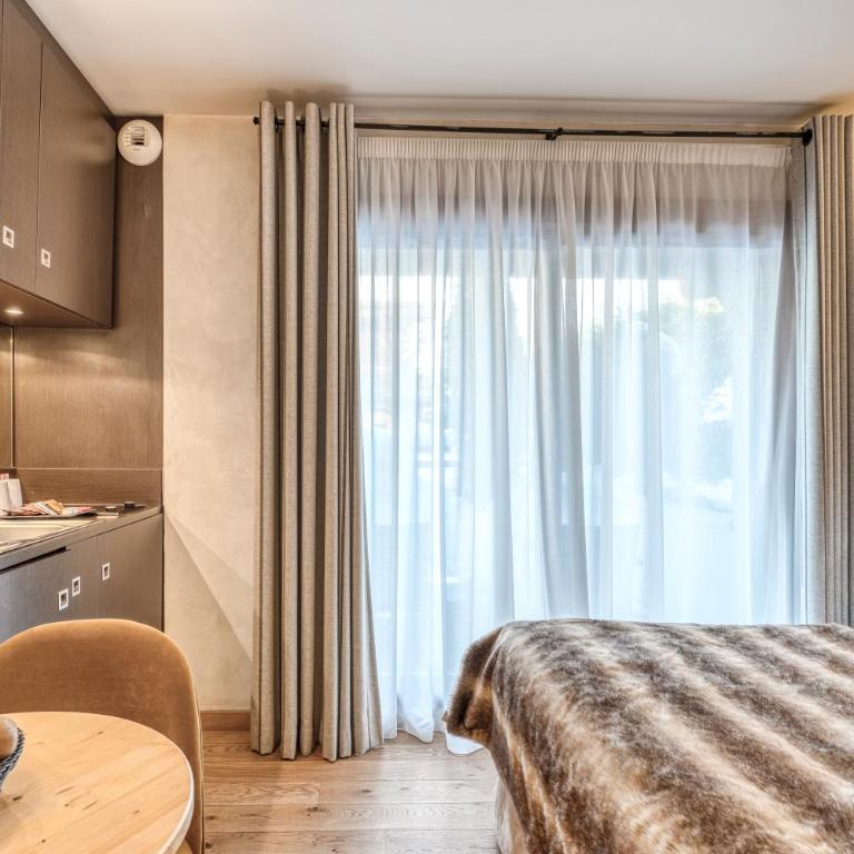 Les Loges Blanches Megève - Chambre Double avec Terrasse - 1