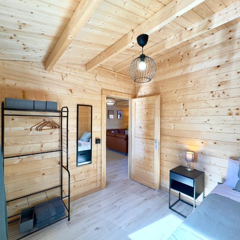 Casa de Madera La Parcela - Casa de 3 dormitorios - 48