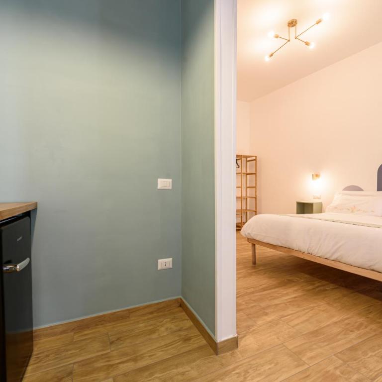 EcoSuite Spaccanapoli - Camera Matrimoniale Deluxe con Balcone - 6