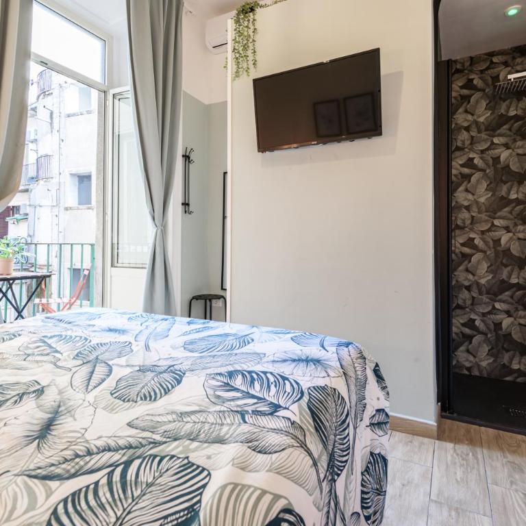 EcoSuite Spaccanapoli - Camera Matrimoniale con Balcone - 11