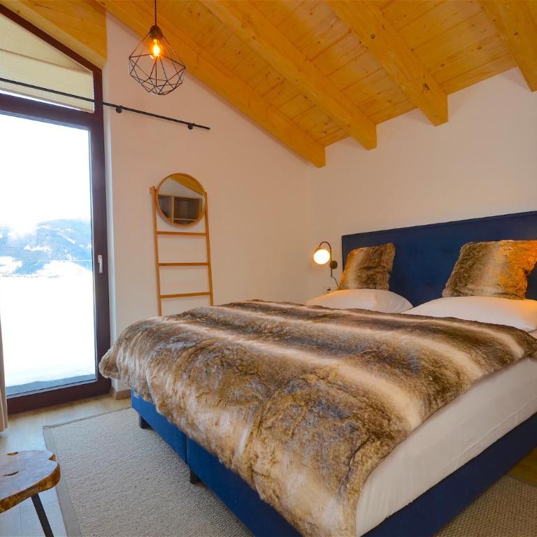 Ski-in Ski-out Chalet Maiskogel 17C - by Alpen Apartments - Ferienhaus - 17