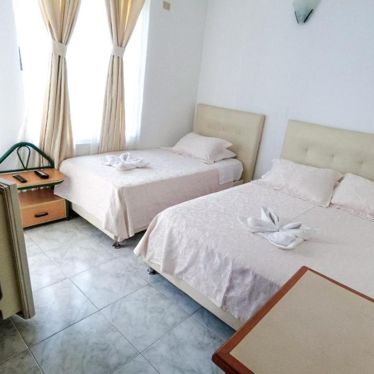 Hotel Miami en Melgar - Habitación Triple - 1
