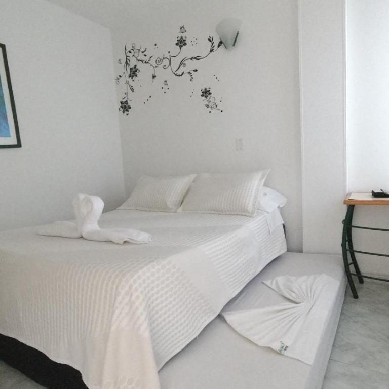 Hotel Miami en Melgar - Habitación Cuádruple con balcón - 3