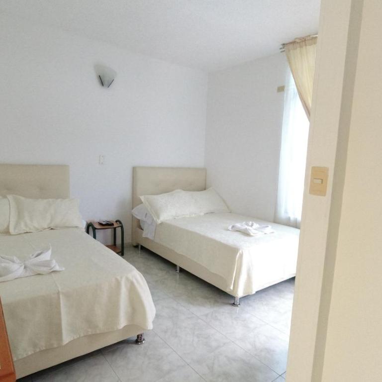 Hotel Miami en Melgar - Habitación Cuádruple con balcón - 1