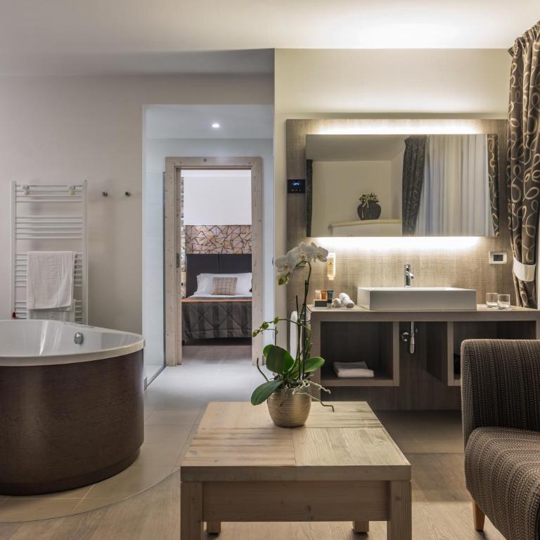 Alpenresort Belvedere - Suite mit Balkon und Seeblick - 5