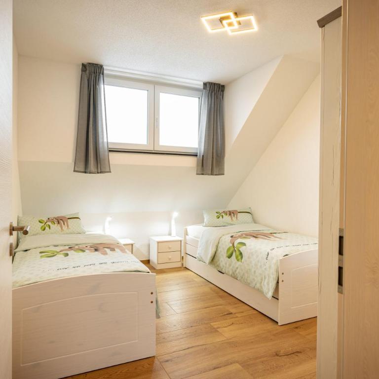 Ferienwohnung Müller GbR - Apartment mit 2 Schlafzimmern und Dusche - 7