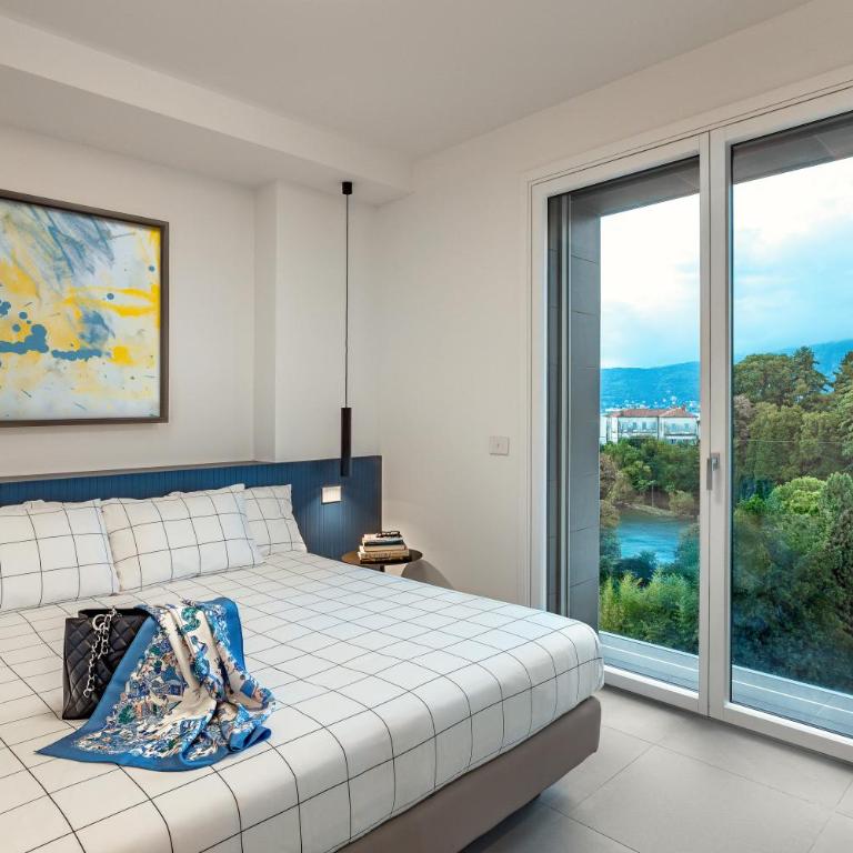 Residenza Montebello - Appartamento con Vista Lago - 10