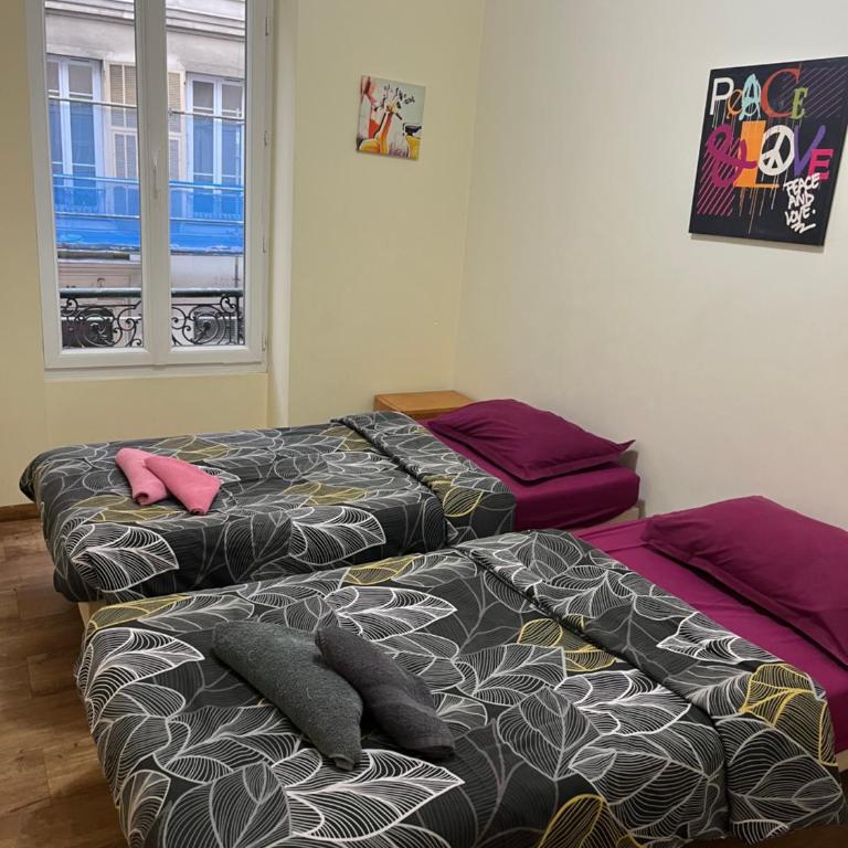 Hôtel Lyonnais - Chambre Lits Jumeaux - 1