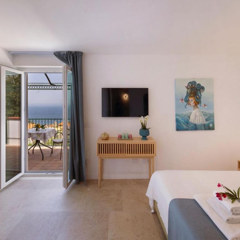 Villa Mundis Relais - Camera Deluxe Matrimoniale con Vista Mare - 1