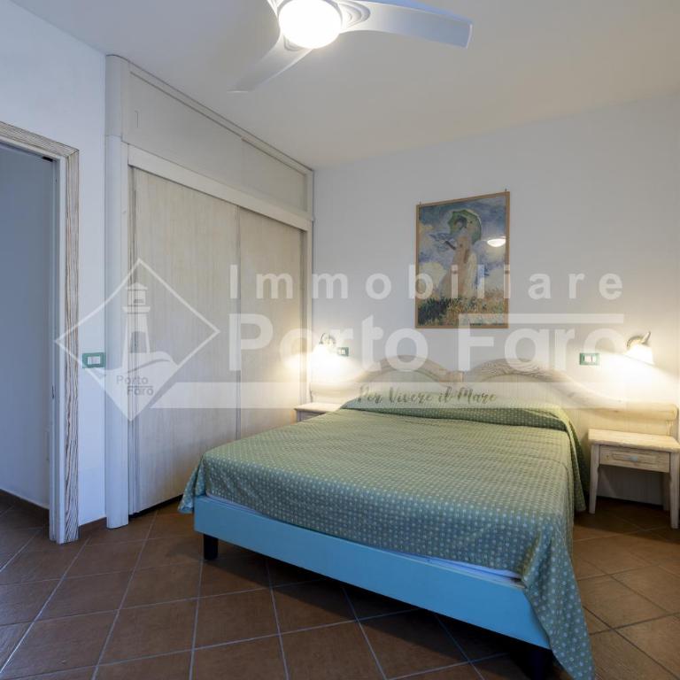 L301 - Bilocale caposchiera con giardino e vista sulla spiaggia di Porto Mannu - Appartamento con Vista Mare - 11