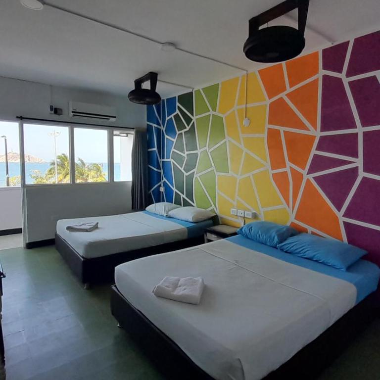 Panamerican Hostel - Habitación Cuádruple con balcón - 1