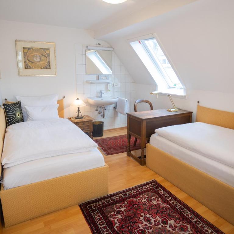 Gästehaus Englischer Garten - Economy Doppel- oder Zweibettzimmer mit Gemeinschaftsbad - 6