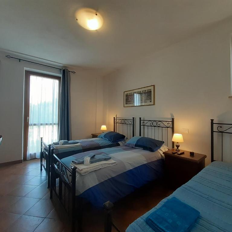 B&B La Verbena - Camera Matrimoniale/Doppia con Letti Singoli con Letto Supplementare - 2