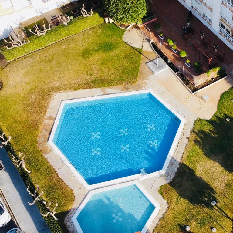 A 5 min de la playa con PISCINA Ideal parejas Relax total ''Bouquet Dream La Pineda'' - One-Bedroom Apartment - 22