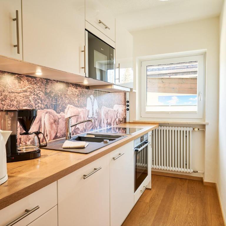 Oberstdorfer Ferienwelt - Ferienwohnung mit 1 Schlafzimmer und Westbalkon - 11
