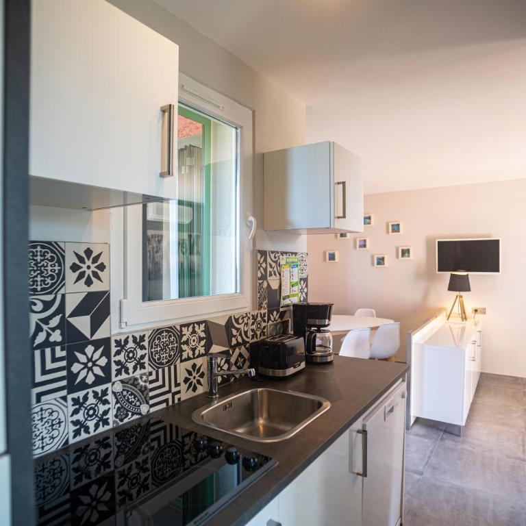 Résidence Padro - Appartement 1 Chambre Climatisé - 13