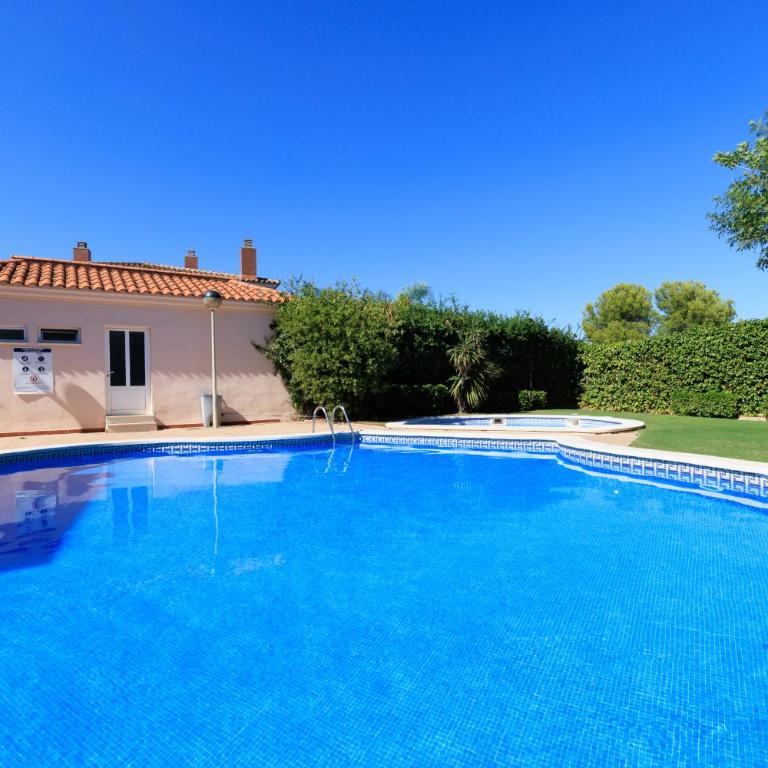 Adosado con jardín en los Xalets de Salou - Casa - 10