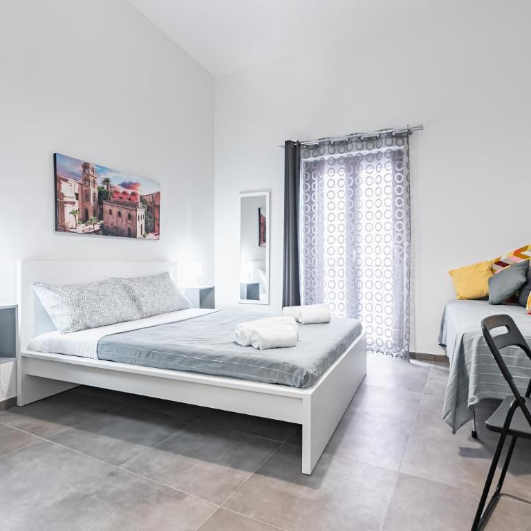 GuestHost - Palazzo dei Normanni & Ballarò Roomy Modern Apt x9 - Appartamento con 3 Camere da Letto - 5