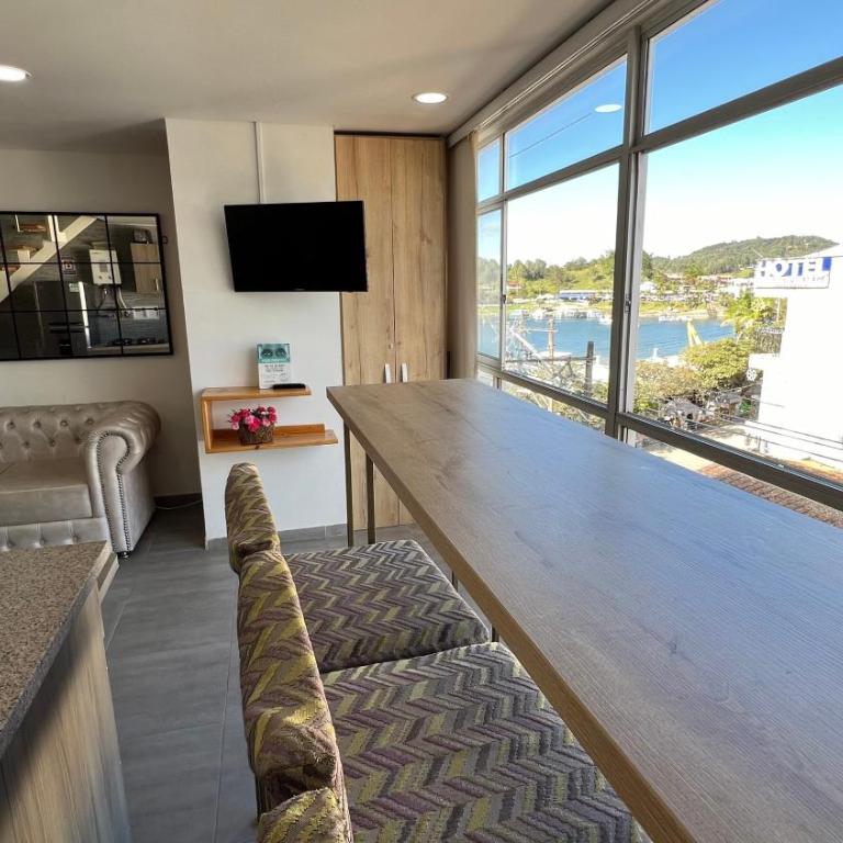 Aptos vista al Embalse, frente al lago, Restaurantes, Bares - Apartamento Superior - 32