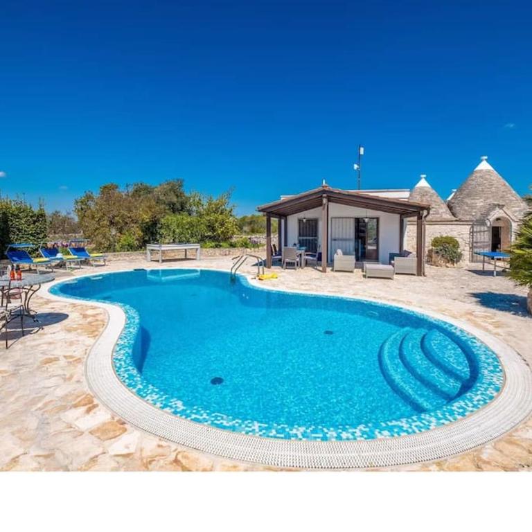 Trullo Olivia con piscina riscaldata, natura e relax - Three-Bedroom House - 71