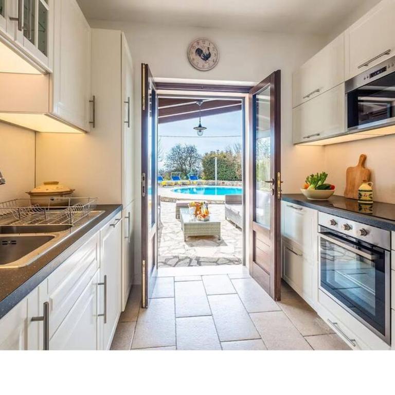 Trullo Olivia con piscina riscaldata, natura e relax - Three-Bedroom House - 11
