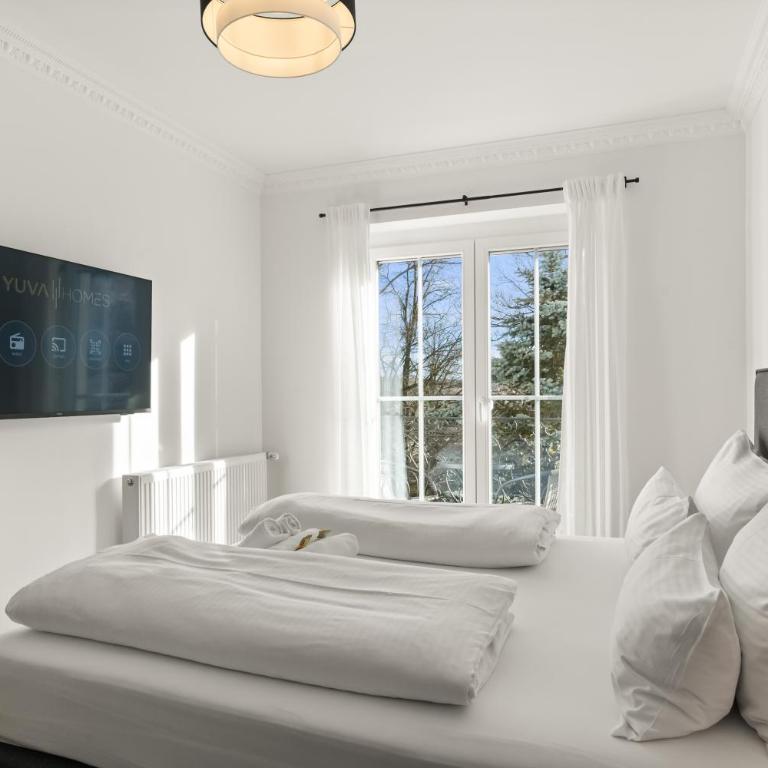 YUVA HOMES am Kurpark - BRIGHT Collection - Apartment mit Gartenblick - 2