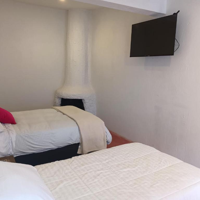 Casa de huéspedes en Usaquén - Habitación Triple Básica con baño compartido - 2