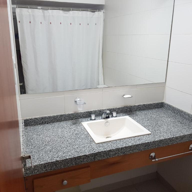 Monoambiente con balcón y cochera privada - TV 50" 4K y Sonido DTS-5'1 - Apartamento de 1 dormitorio - 23