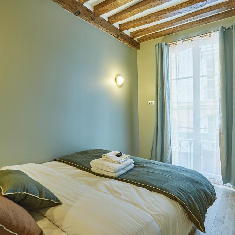 Residence Center of Paris by Studio prestige - Three-Bedroom Apartment - 16