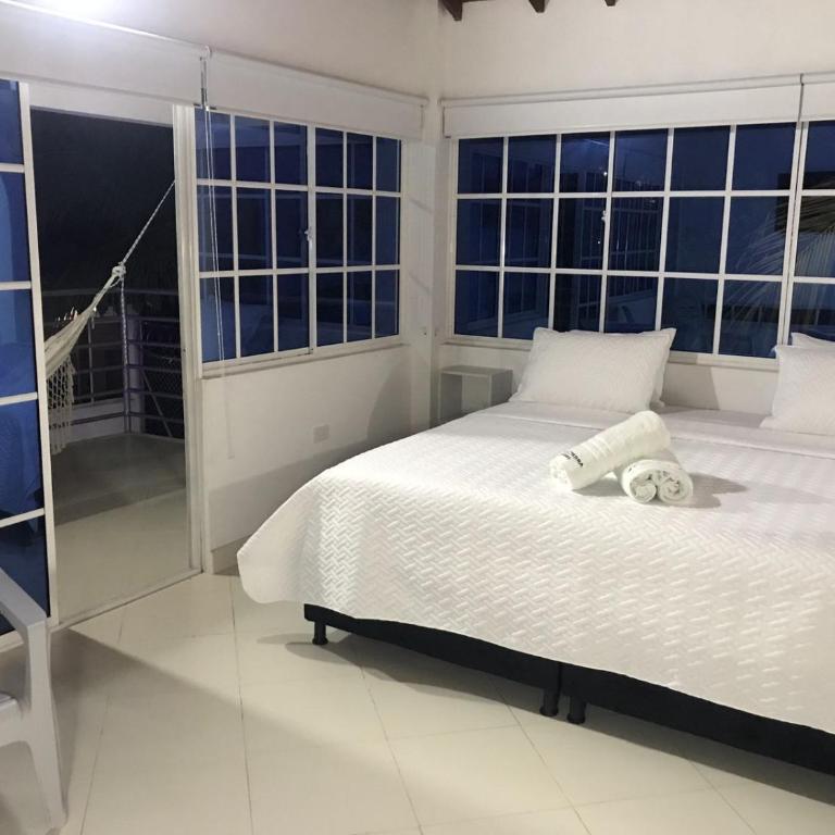 Hotel Punta Piedra - Suite con cama grande y balcón - 3