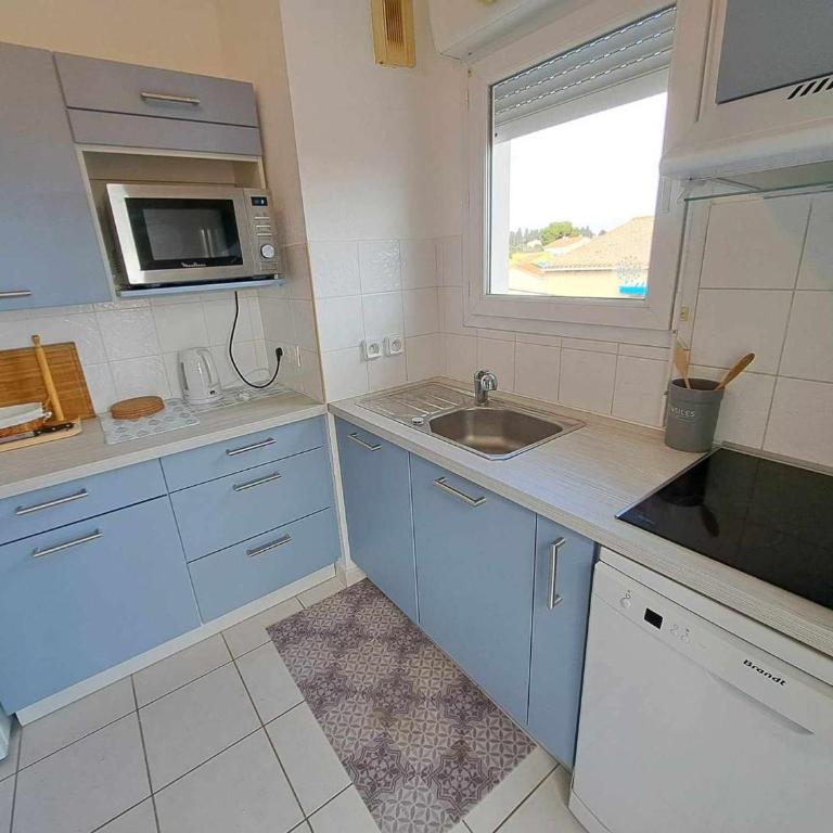 Appartement 3 pièces climatisé avec terrasse à Marseillan, parking privé, proche des commodités - FR-1-326-806 - Appartement - 9