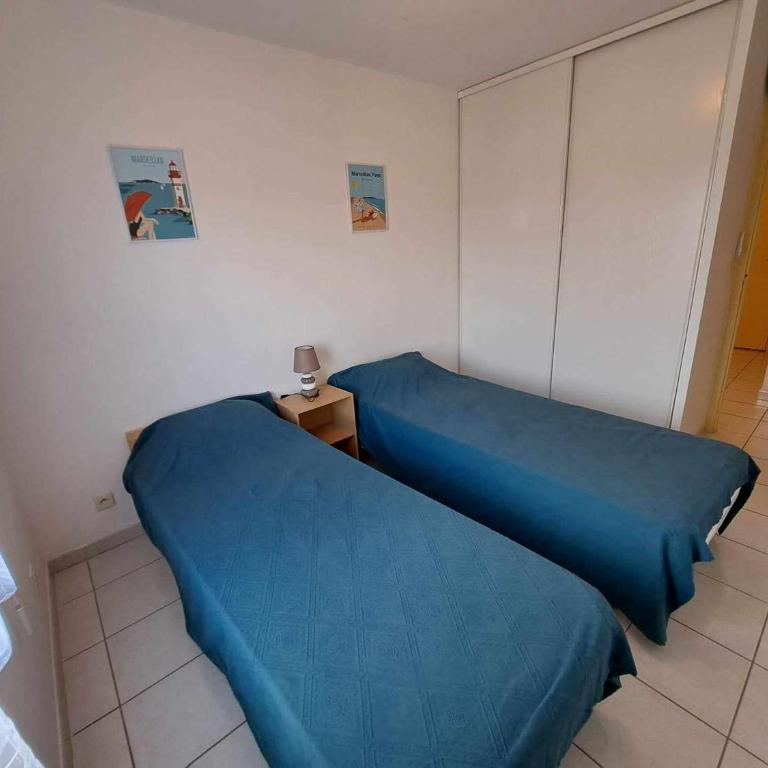 Appartement 3 pièces climatisé avec terrasse à Marseillan, parking privé, proche des commodités - FR-1-326-806 - Appartement - 12