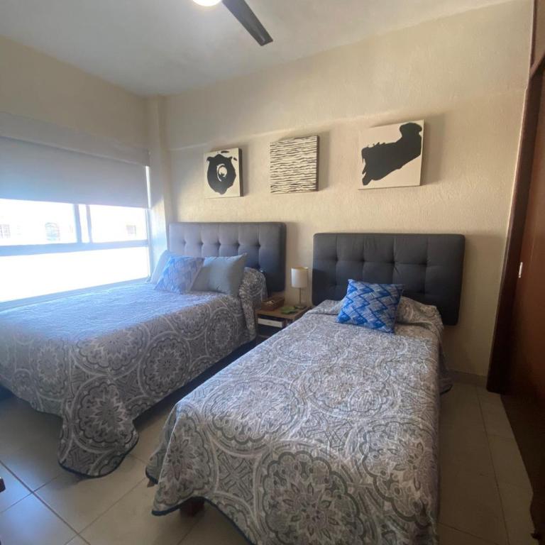 Hermoso condominio c. Alberca y cercano a la playa - Apartamento de 2 dormitorios - 33