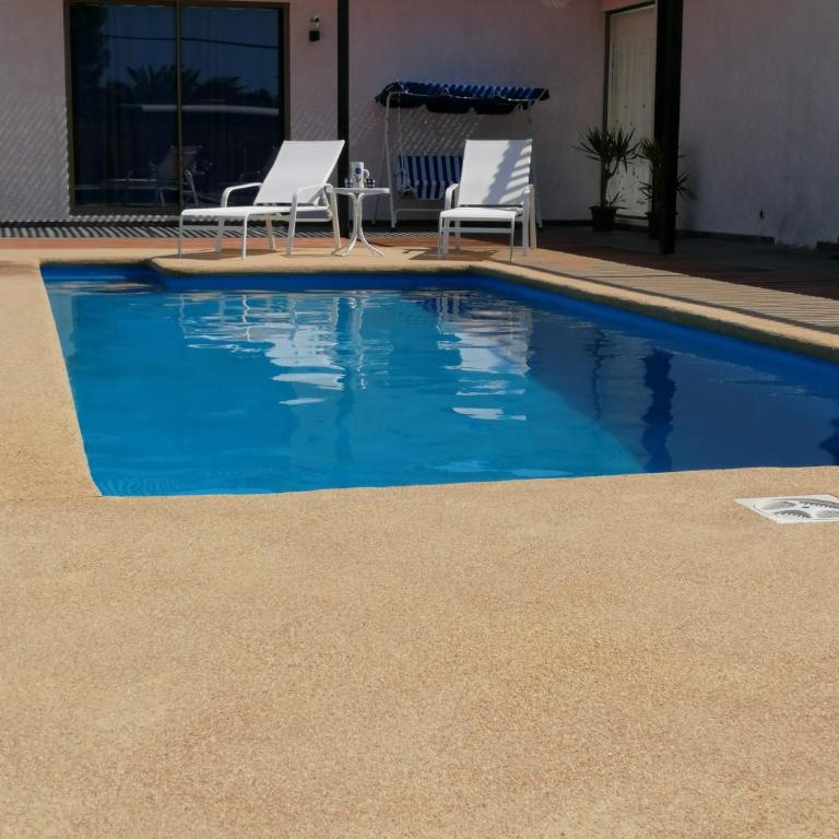 WANNAQUEROS SUITES - Three-Bedroom House - 2