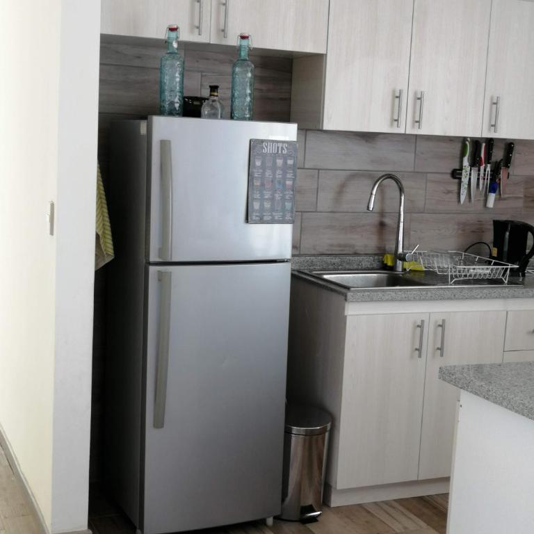 WANNAQUEROS SUITES - Three-Bedroom House - 4