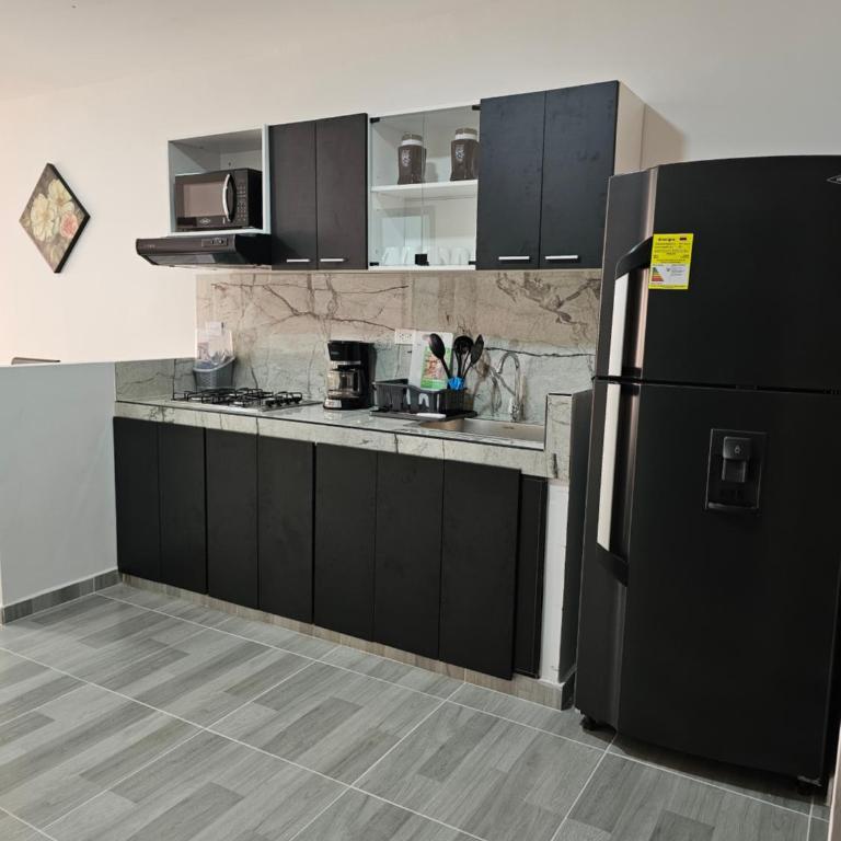 Zavara Hostal - Pueblo Tapao, 321-609-4407 - Three-Bedroom Apartment - 2