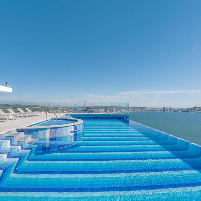 Moderno condominio con vista al mar! - Two-Bedroom Apartment - 33