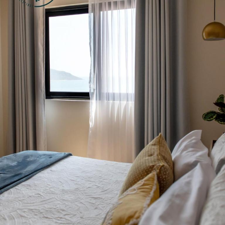Moderno condominio con vista al mar! - Two-Bedroom Apartment - 26