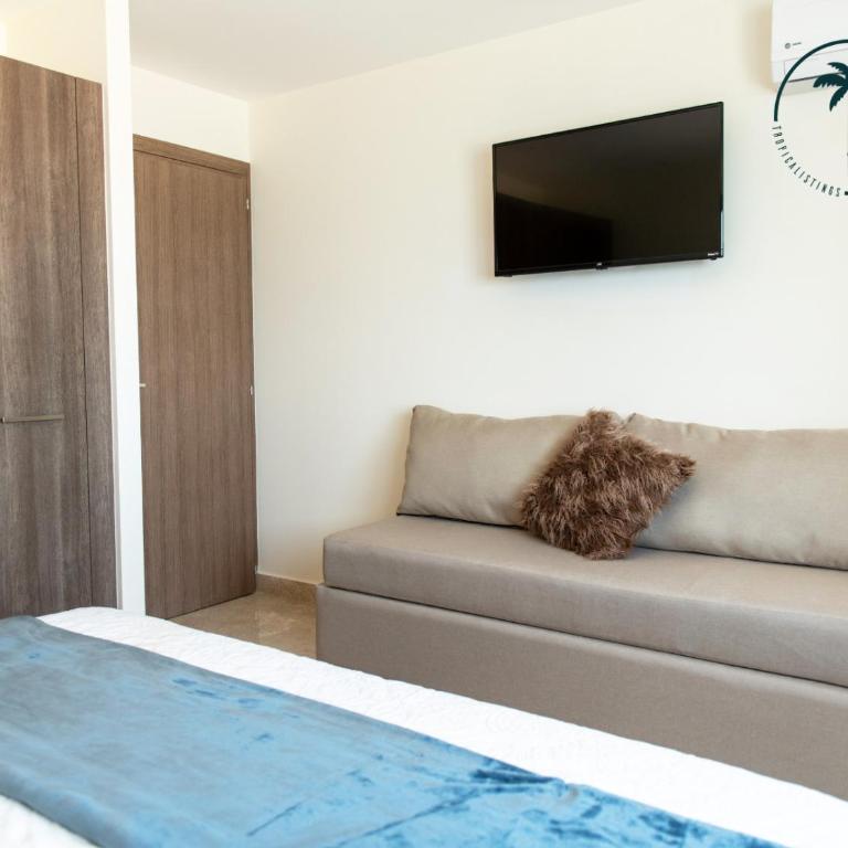 Terraza con Vista al Mar, BBQ y Piscina - Two-Bedroom Apartment - 12