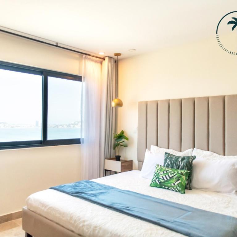 Terraza con Vista al Mar, BBQ y Piscina - Two-Bedroom Apartment - 14