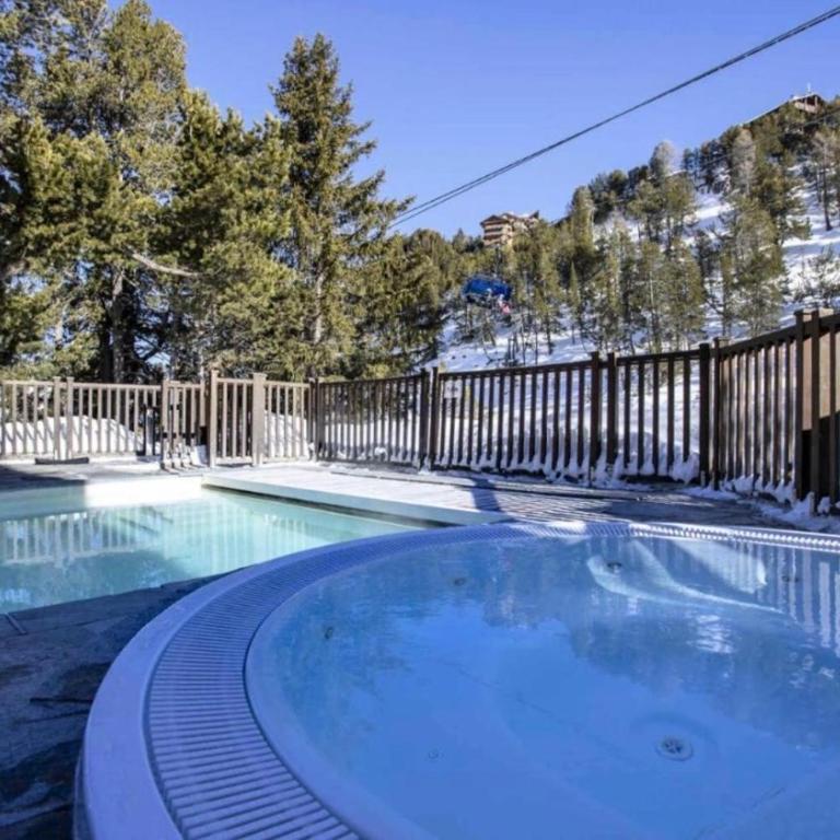 Arc 1950 - Appt 2CH - 6 pers - Rés 5* luxe - Piscine, sauna, hamman, jacuzzi - Classé 5 cristaux Paradiski - Apartment mit 2 Schlafzimmern - 17