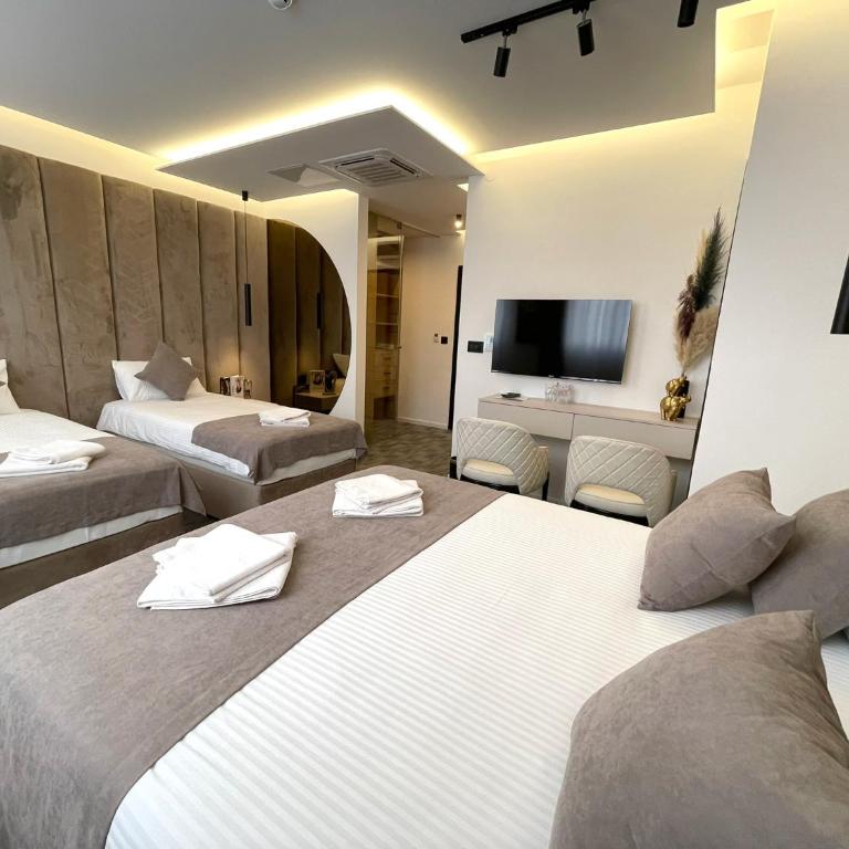 Hotel NPL CODE - Deluks Četvorokrevetna Soba - 1