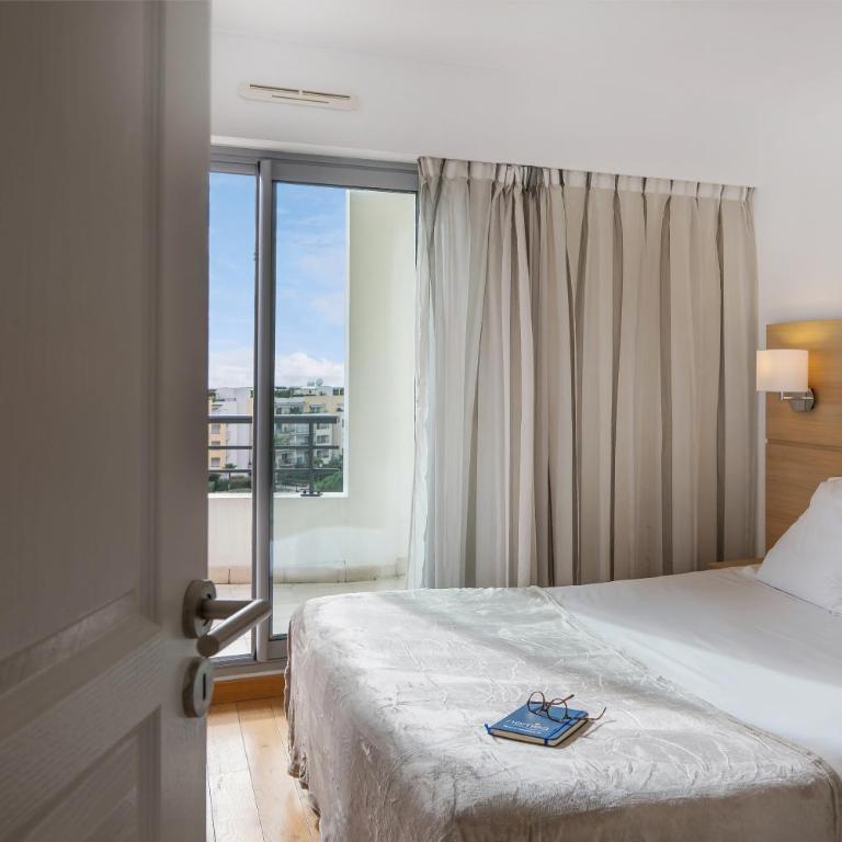 Nemea Appart Hotel Le Lido Cagnes sur Mer - Apartment mit 1 Schlafzimmer und Poolblick (4 Erwachsene) - 1