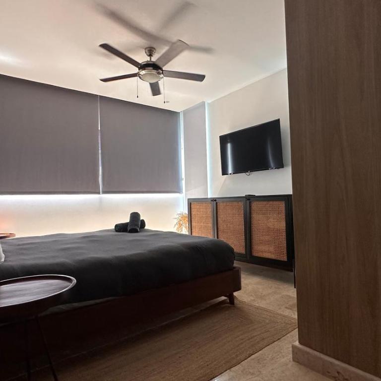 Ipana Luxury Suites By Caribe Rentas - Apartamento de 2 dormitorios con vistas al jardín - 2