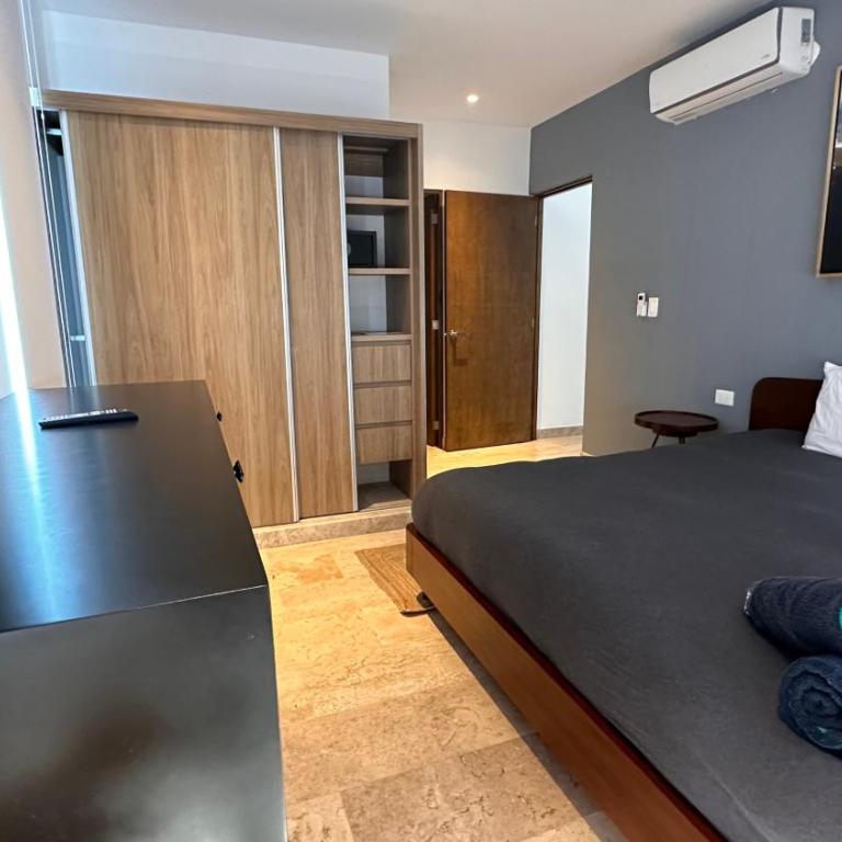 Ipana Luxury Suites By Caribe Rentas - Apartamento de 2 dormitorios con vistas al jardín - 3