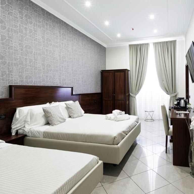 Monti 66 Hotel - Camera Tripla Deluxe - 17