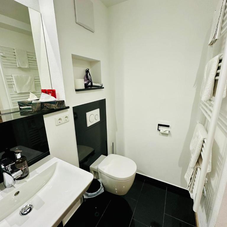 Gästehaus Bühler - Doppelzimmer mit Bergblick - 9