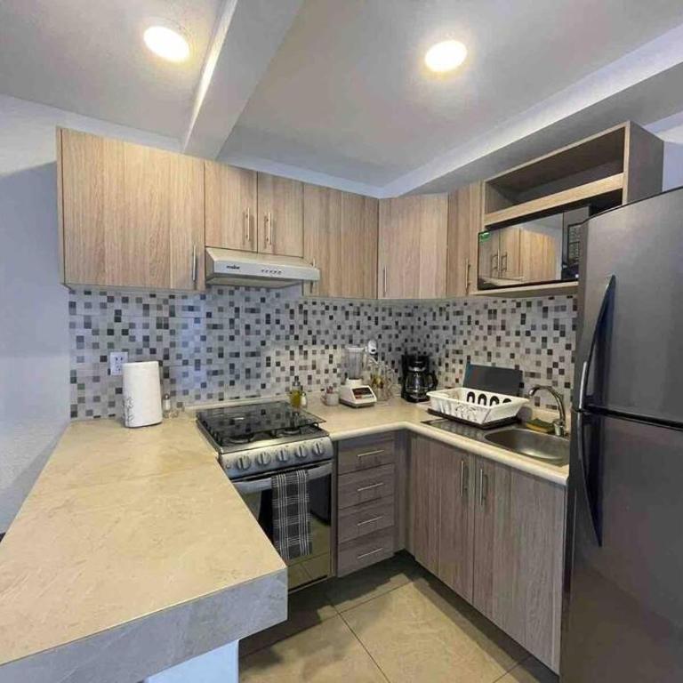 Departamento a 5 min. del Aeropuerto CDMX. - Apartamento de 2 dormitorios - 24