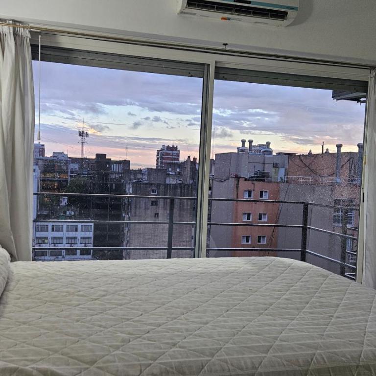 Monoambiente con balcón y cochera privada - TV 50" 4K y Sonido DTS-5'1 - Apartamento de 1 dormitorio - 4
